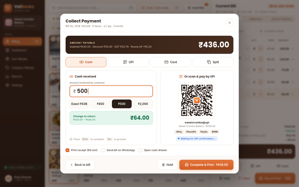 VelBooks POS payment window: Cash, UPI, Card and Split tabs, cash tendered with change to return, a UPI QR code to scan, and options to print the receipt, send the bill on WhatsApp and open the cash drawer